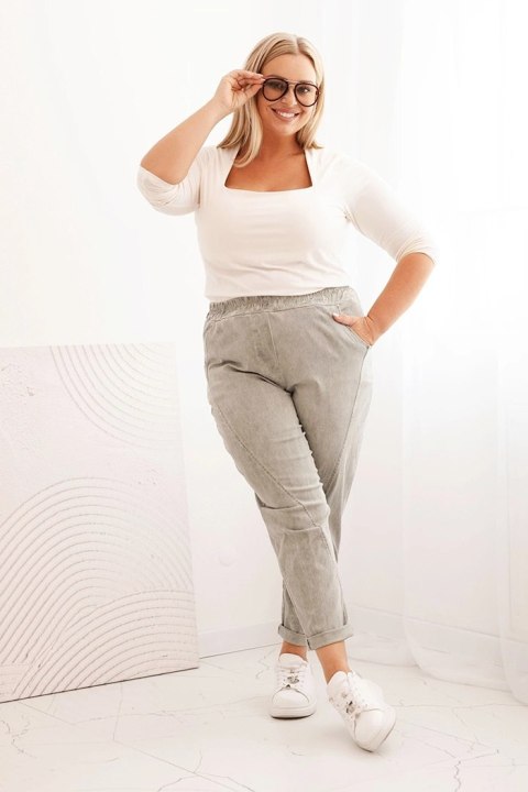 Spodnie damskie dekatyzowane Plus Size z gumką i kieszeniami beżowe