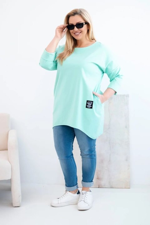Bluzka damska Plus Size z dłuższym tyłem i długim rękawem miętowa